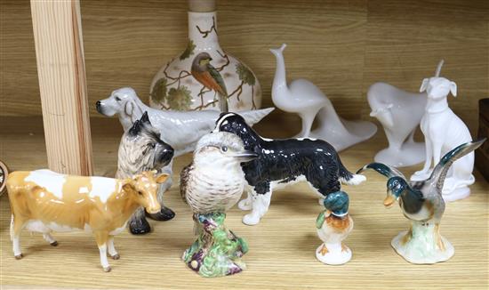 Three Beswick figures including a Jersey cow and seven other ceramic animals including one Parian and two